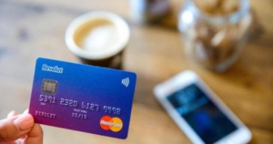 Image of a Revolut card in a BOLD Awards blog about benefits of finance automation for startups